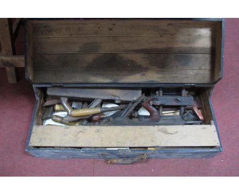Chisel's, planes, other tools, in a tool box.