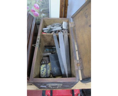 Drill Bits, steel rulers etc, in a tool box.