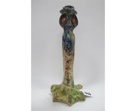 Glazed Earthenware Elongated Candlestick, circa 1920's as an owl, 27.5cm high (damages).