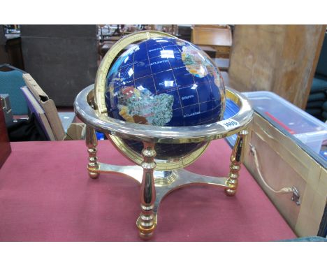 Mineral Terrestrial Globe, in gilt metal stand with compass to stretchers, 28cm high.