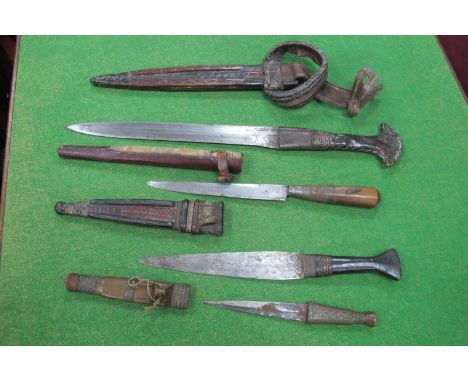 African Style Dagger, with leather handle and sheath, 43cm long, three others, the smallest with entwined wire work to wooden