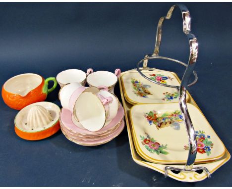 Four Paragon china tea cups and saucers with pink floral and gilt pattern, together with a Burslem china cake stand and five 