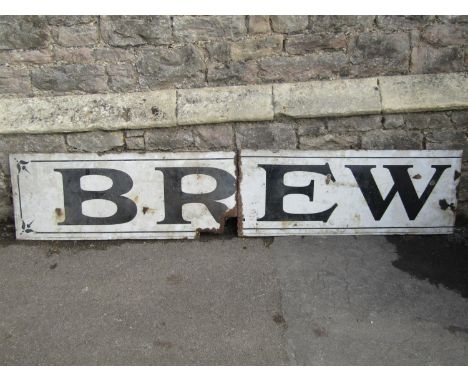 A vintage enamel sign of rectangular form in two sections, cream ground with black lettering 'Brew', approx 2m long x 40cm hi