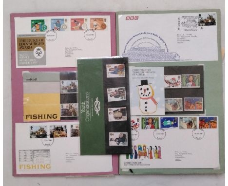 Three albums containing a quantity of First Day Cover and Royal Mail mint stamp collections (3) 