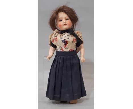 Small early 20th century bisque head doll by Armand Marseille, height 22cm, with closing blue eyes, open mouth with teeth, ro