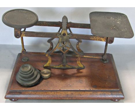 A set of 19th century postal scales with an incomplete and odd set of weights. 