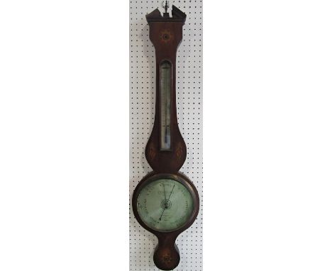 A Georgian mahogany wheel barometer with silvered dials and shell inlaid detail, maker N. Ortelli 