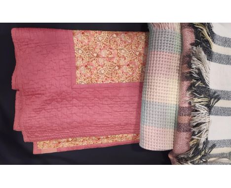 Vintage reversible machine stitched quilt, with blocks of pink contrasted with multicoloured paisley print 215x170 cm togethe