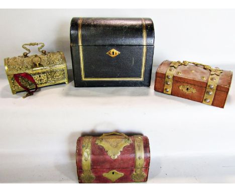 A Victorian leather bound writing box with gilt detail, with a hinged domed lid opening to reveal a stationery rack pen well 