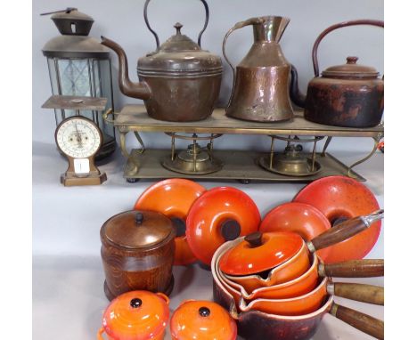 Kitchenalia: A set of four Le Creuset orange saucepans (as found), copper kettles, a brass plate warmer with two burners, wei