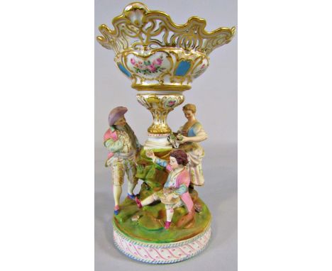 19th century continental bisque table centre of three characters around a central vase, (af) 26cm tall 