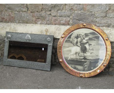 A arts and crafts wall mirror of rectangular form, overlaid hammered pewter clad frame with raised club and roundel detail, 5
