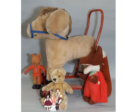 Mixed toy lot including a vintage wheeled ride on donkey, a Basil Brush toy by Wendy Boston, Rupert bear, a Merrythought bear