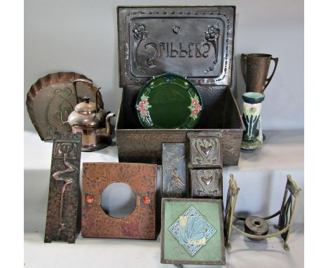 A collection of arts and crafts and art nouveau items principally in copper comprising spirit kettle and stand, letter rack, 