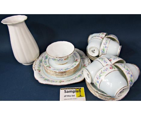 A collection of Adderley bone china tea wares including sugar bowl, eight cups, eight saucers, seven side plates, cake plate,