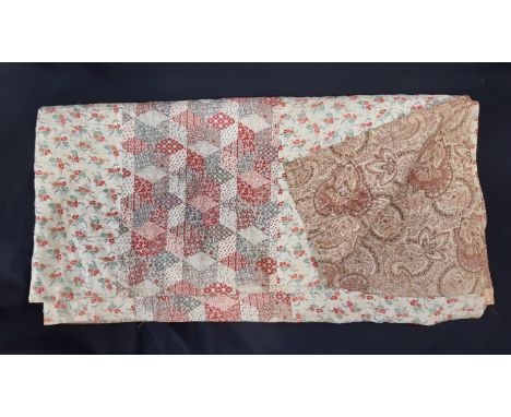 Vintage reversibile quilt with large sections of printed cottons stitched together and quilted in running stitch 2x1.9m. (dia