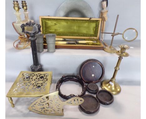 A miscellaneous collection of items including, a Victorian cast iron door stop, a pair of onyx table lamps, a brass kettle st