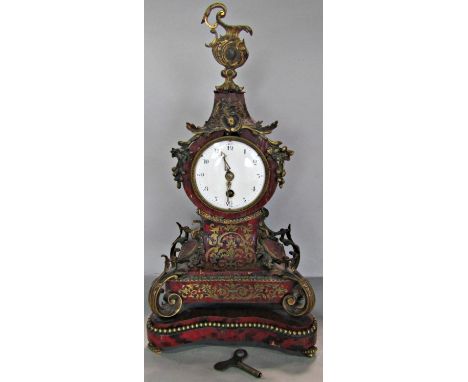 A 19th century scarlet boulle work mantle clock, the brass inlay to a foliate design, enclosing an eight day time piece with 