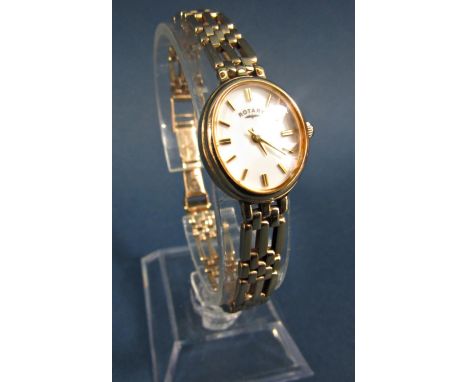 Rotary ladies wristwatch, the oval dial within a 9k gold case (with presentation script) and 9k strap, with original case, bo