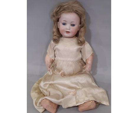 Early 20th century bisque head character doll by the Mengersgereuth Porzellanfabrik company, with 5 piece composition body (s