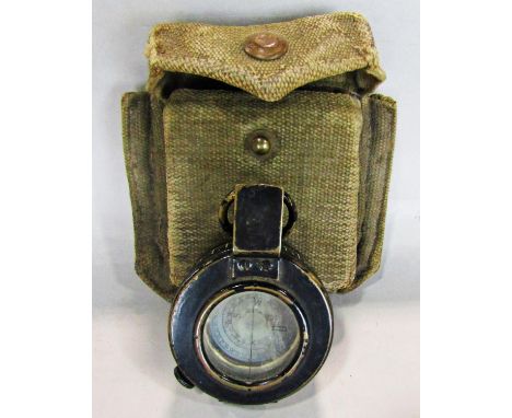A WWII 1940 MK II T.G.Co Ltd compass in its khaki canvas pouch. 