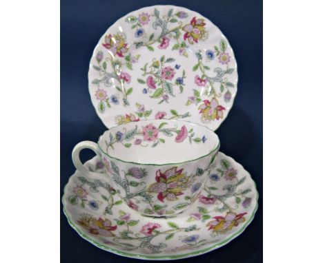 A collection of Minton Haddon Hall pattern tea wares, comprising seven cups, six saucers, five side plates and a sandwich pla