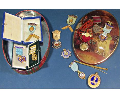 A collection of Masonic regalia comprising eleven silver and silver gilt jewels many with enamel detail, the majority St Aldh