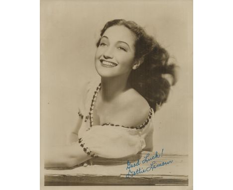 Dorothy Lamour signed 10x8 inch Sepia vintage photo. Good Condition. All autographs come with a Certificate of Authenticity. 