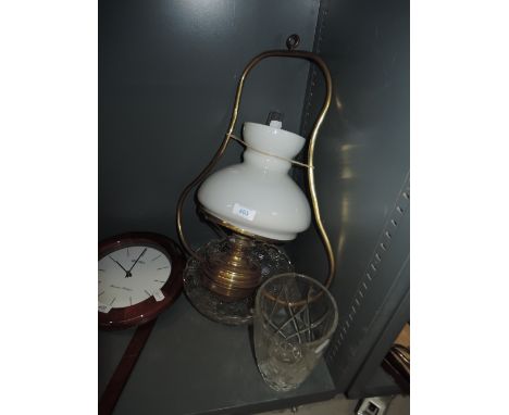 A hanging oil lamp etc
