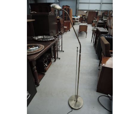 A modern brass reading lamp
