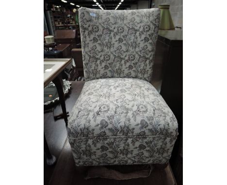 A late 19th century box seat bedroom chair having later tapestry upholstery and oak ball feet