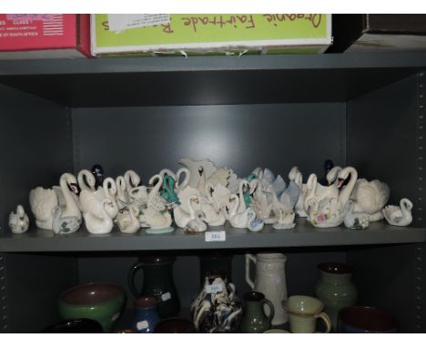 A selection of ceramic and similar swan figures and figurines