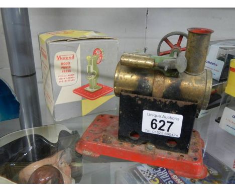A boxed Mamod model power press and a stationary steam engine.