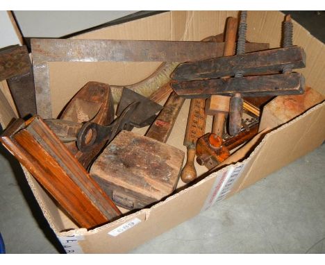 A box of vintage carpenters tools.