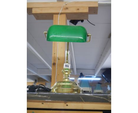 A bankers lamp with green glass shade in working order/