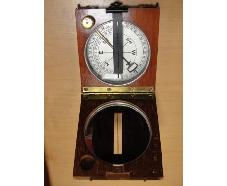 A Vintage cased silver dialled compass
