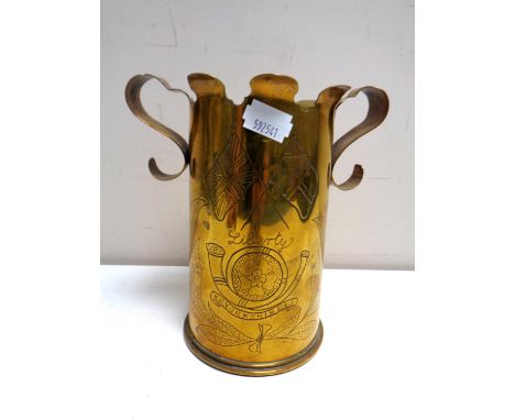 A World War I era trench art brass ammunition shell 