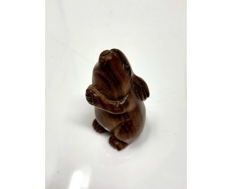 A carved hardwood Chinese netsuke - Rabbit standing