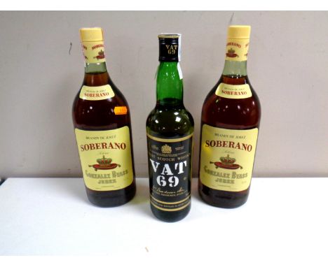 Two bottles of Soberano brandy together with a bottle of Vat 69 Scotch whisky  