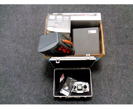 A box containing Samsung DVD VCR recorder, cased Kodak projector, a Yamaha guitar amplifier, together with a boxed iPod stati