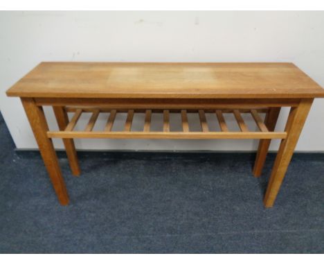 A contemporary oak side table with under shelf  
