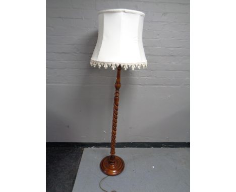 A beech wood barley twist standard lamp with shade 