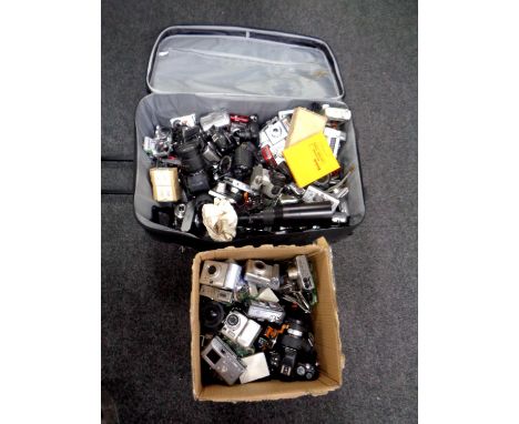 A suitcase and a box containing a large quantity of assorted cameras to include Casio, Canon, Olympus, etc (as found)  