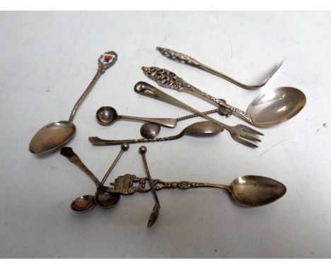 A collection of sterling and continental silver to include baby push with spoon, teaspoons and mustard spoons (11) 