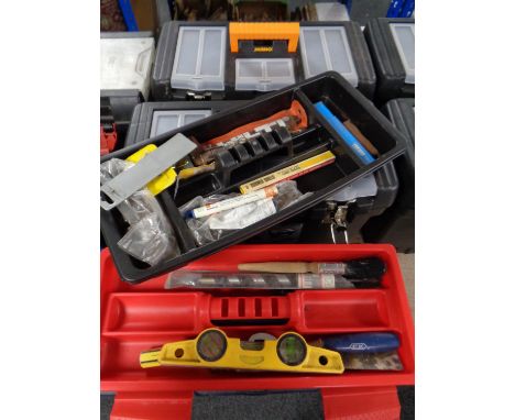 Three plastic toolboxes containing a large quantity of assorted hand tools 