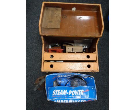 A boxed steam cleaner together with a wooden tool chest containing a small quantity of hand tools and a paraffin lamp 