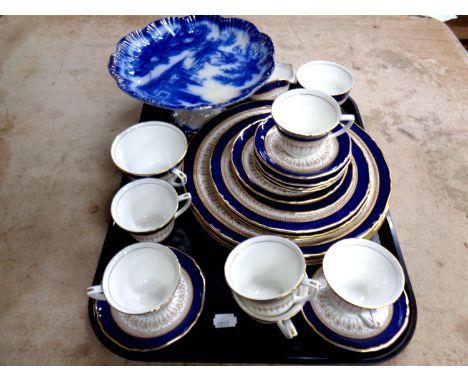 A tray containing 23 pieces of Royal Worcester Regency tea china together with an antique blue and white comport  
