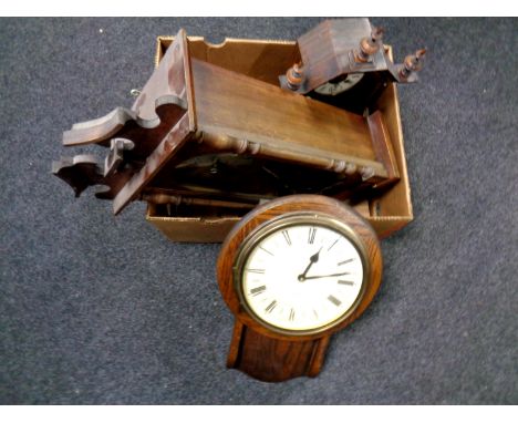A box containing a 19th century pine cased Junghans mantel clock together with two further wall clocks  