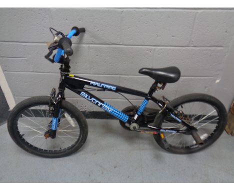 A Silver Fox half pipe BMX bike and an Apollo BMX bike 