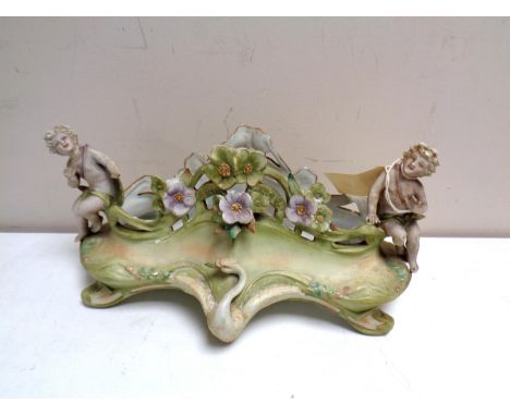 A Victorian cherub flower encrusted planter (a/f)